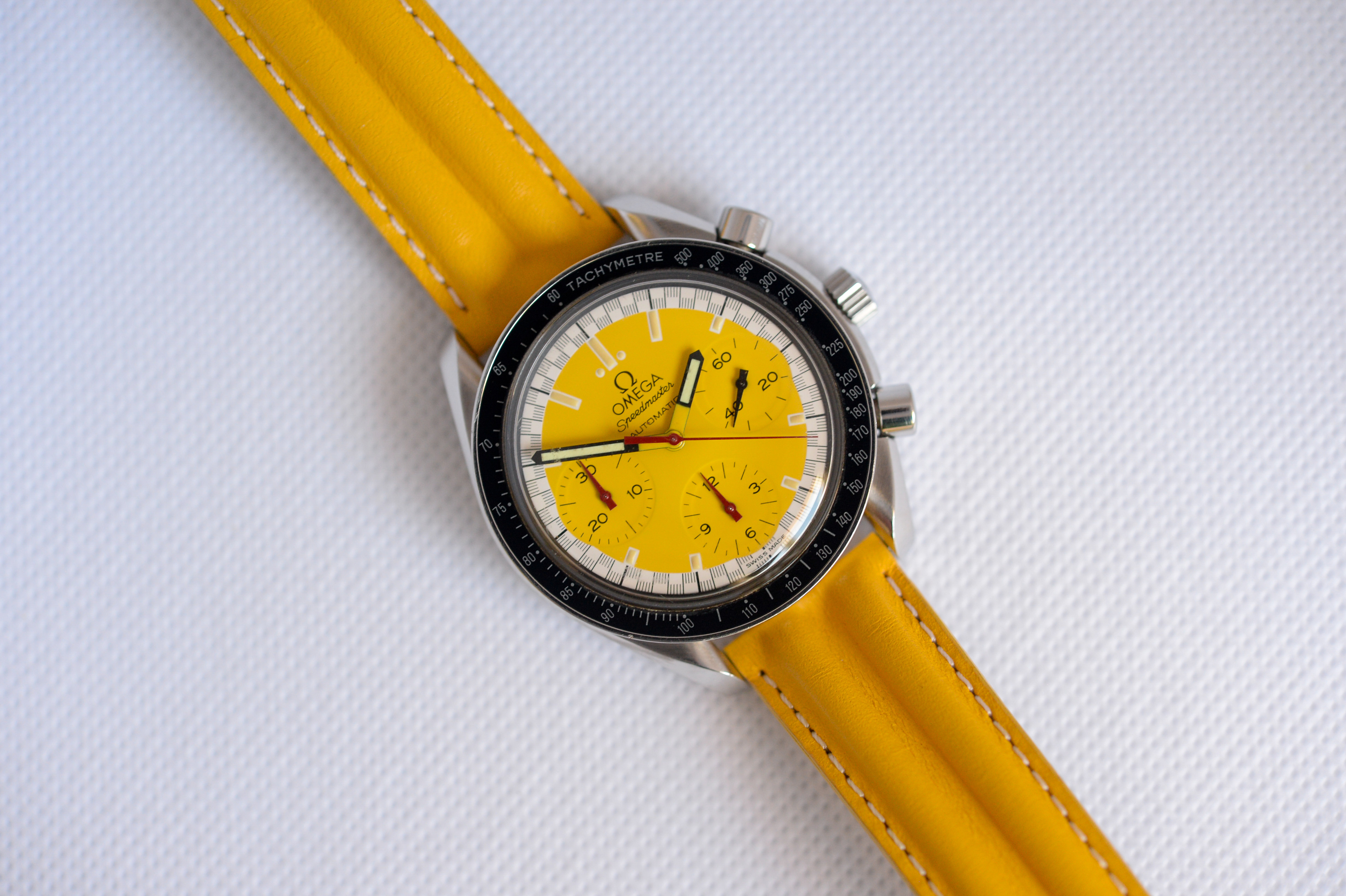 Omega speedmaster hotsell schumacher yellow