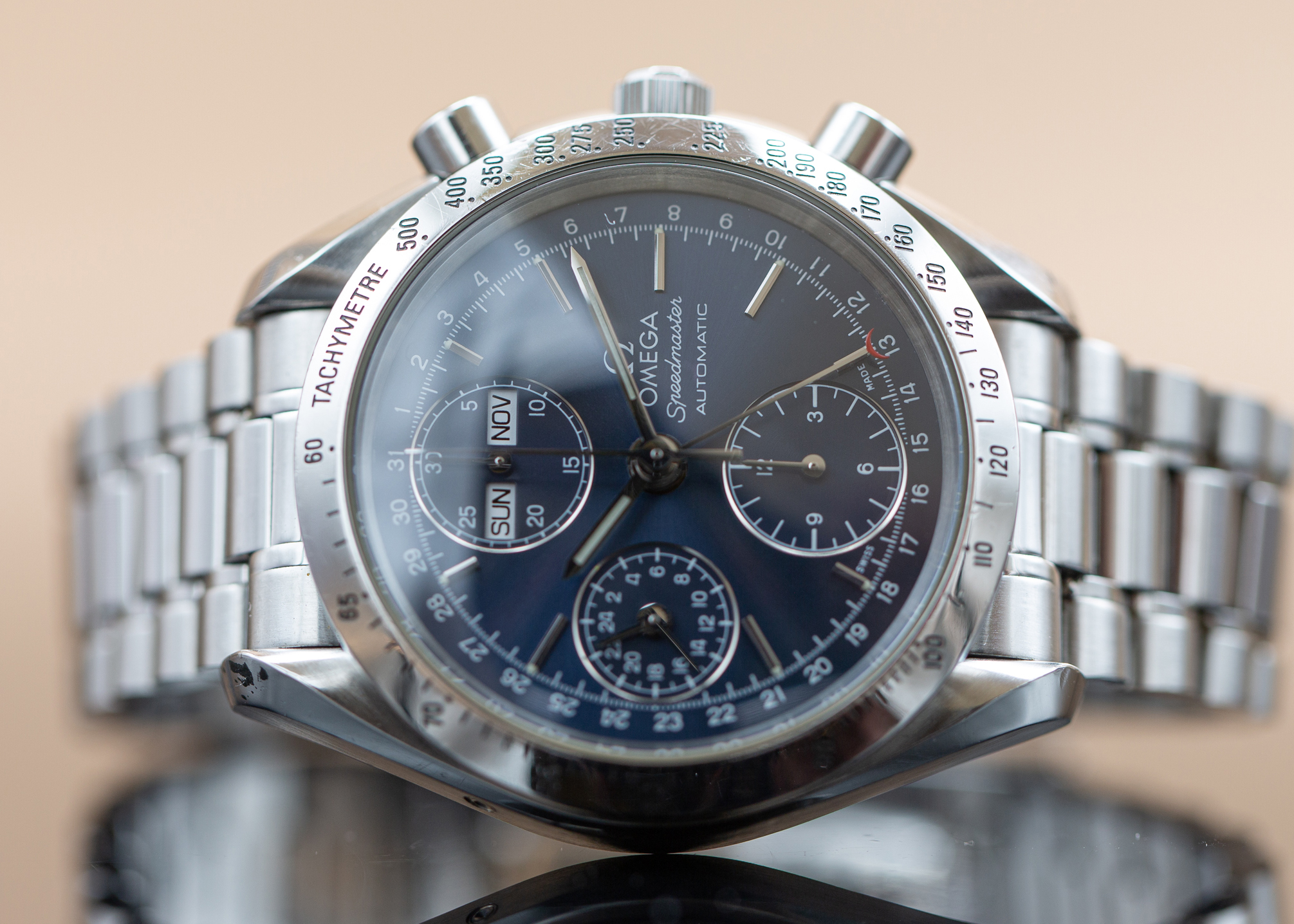 Omega speedmaster day on sale date for sale