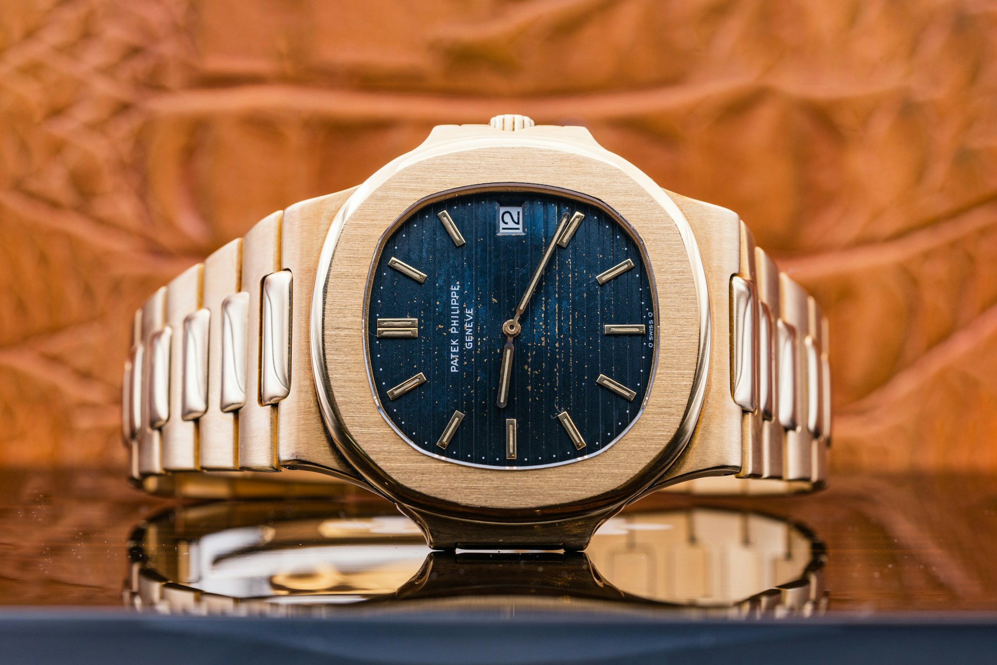 PATEK PHILIPPE ROSE GOLD NAUTILUS MODEL 5711R/1R-001 - Carr Watches