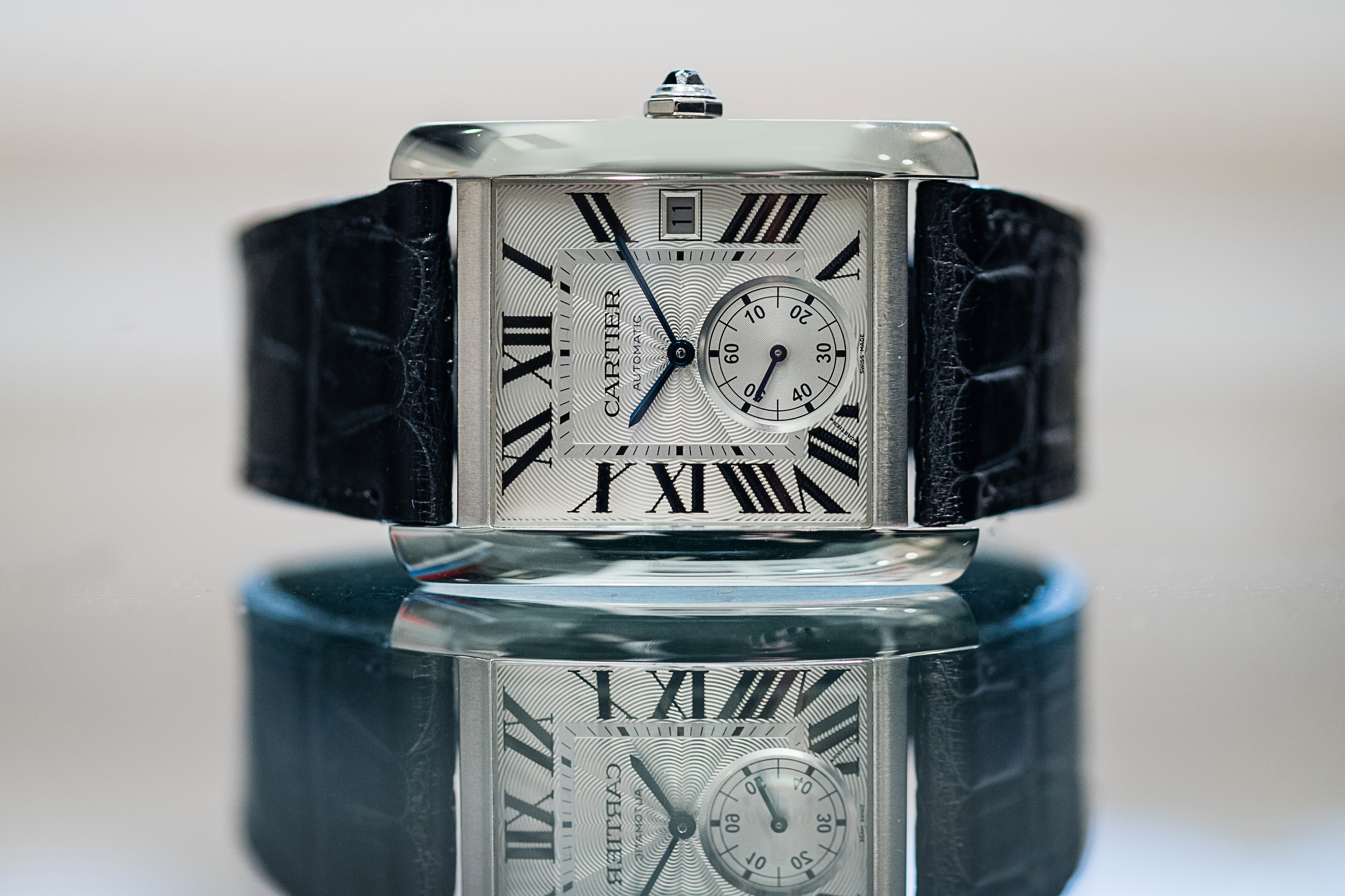 Cartier tank outlet mc price